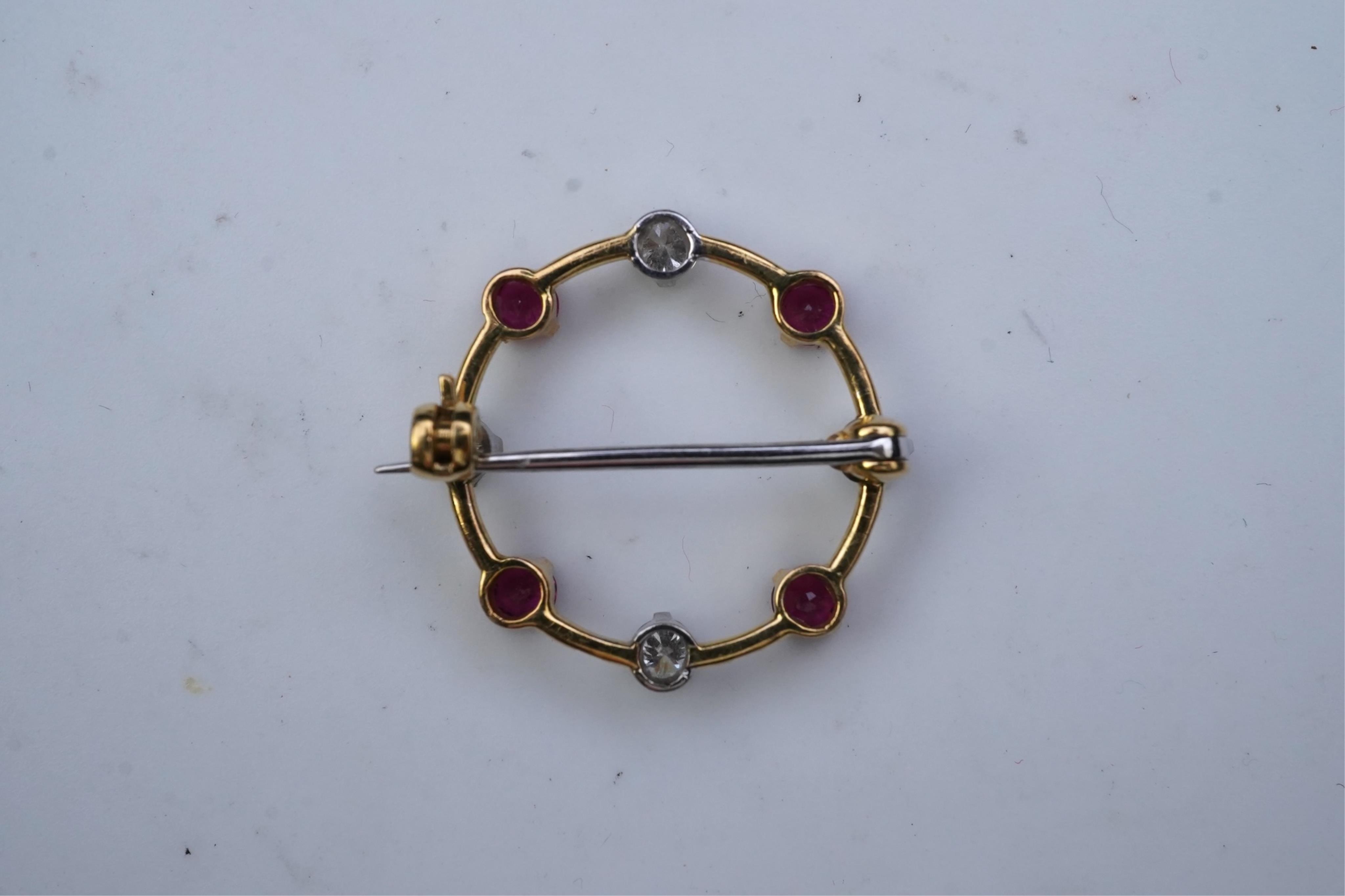 A ruby and diamond brooch